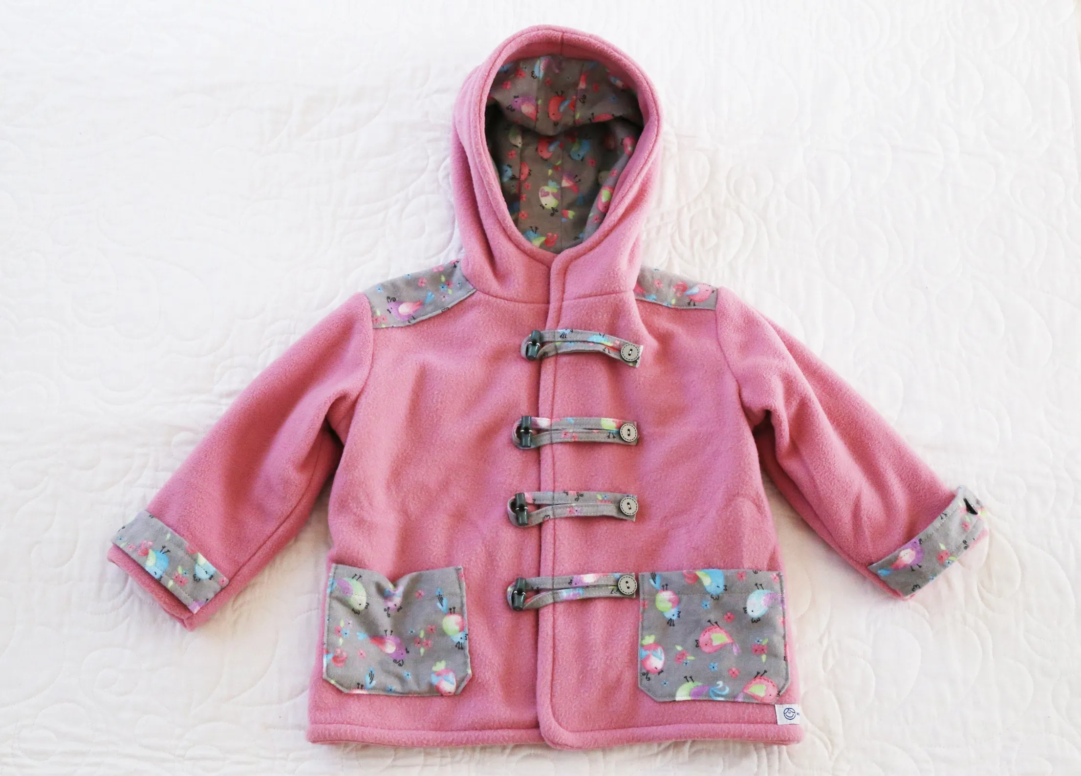Coat - Duffle Coat - Pink Polar Fleece, Lining, Pockets and Toggles with Grey Decorative Bird Flannelette Fabric
